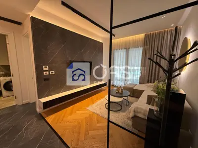 Apartament 1+1 me qera në Kompleksi Deliorgji, Tiranë, 70 m². Foto 1 nga 6