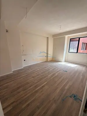 Apartament 1+1 në shitje në Unaza e Re, Tiranë, 60 m². Foto 2 nga 11