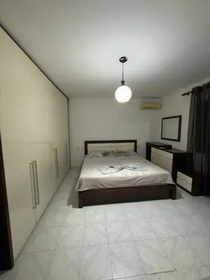 Apartament 1+1 me qera në Pallati me Shigjeta, Tiranë, 75 m². Foto 3 nga 8